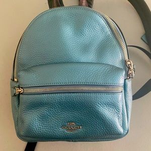Coach Charlie Mini Metallic Sky Blue Leather Backpack
7.25"L x 3.75"W x 9.25"H